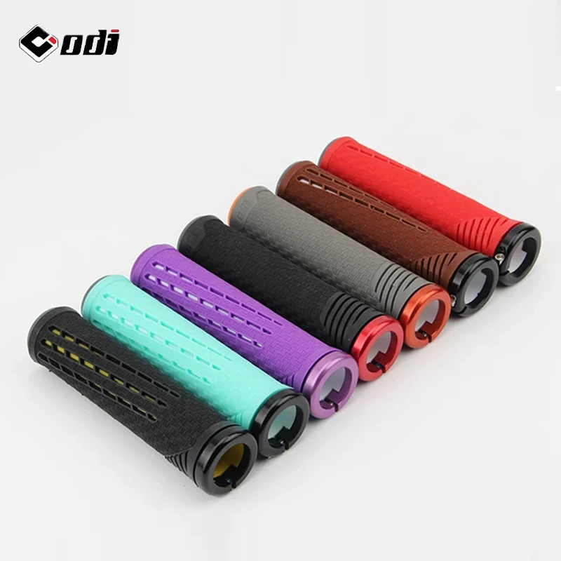 

ODI Bike Parts: Carbon Fiber Reinforced Silicone MTB Grips with Anti - slip Lock - on Cover & Comfortable Handle Plugs