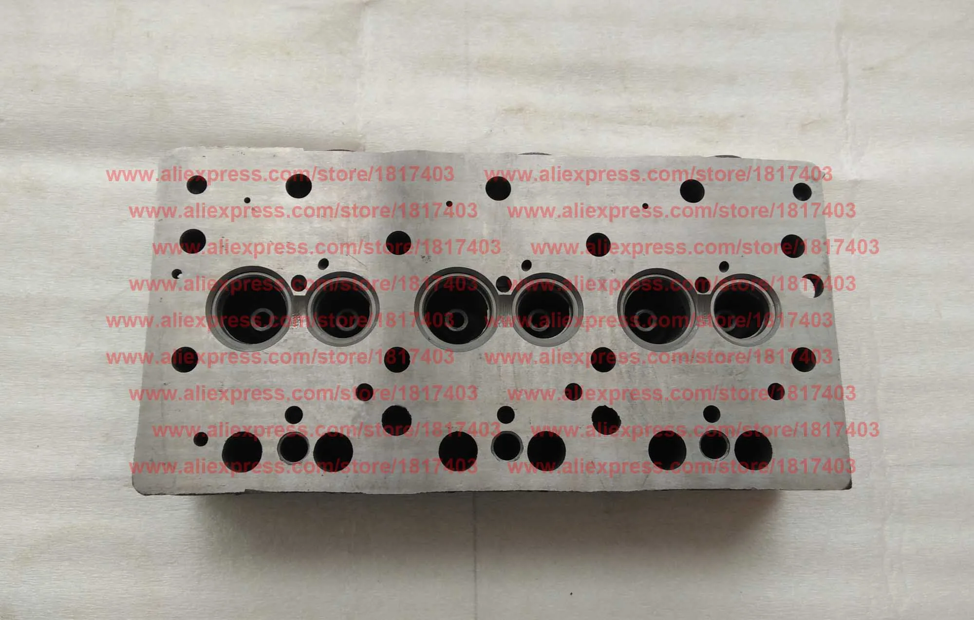 Jiangdong TY3100I.1.1-1 رأس الأسطوانة (طراز 20 مم)، أجزاء محرك الديزل Jiangdong TY3100IT