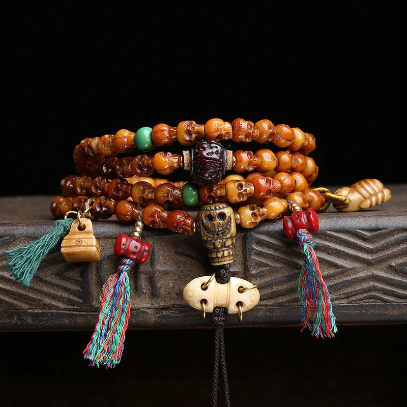 Traditional Yak Bone 108 Rosary With Three-Way Bead And Cloud Pendant