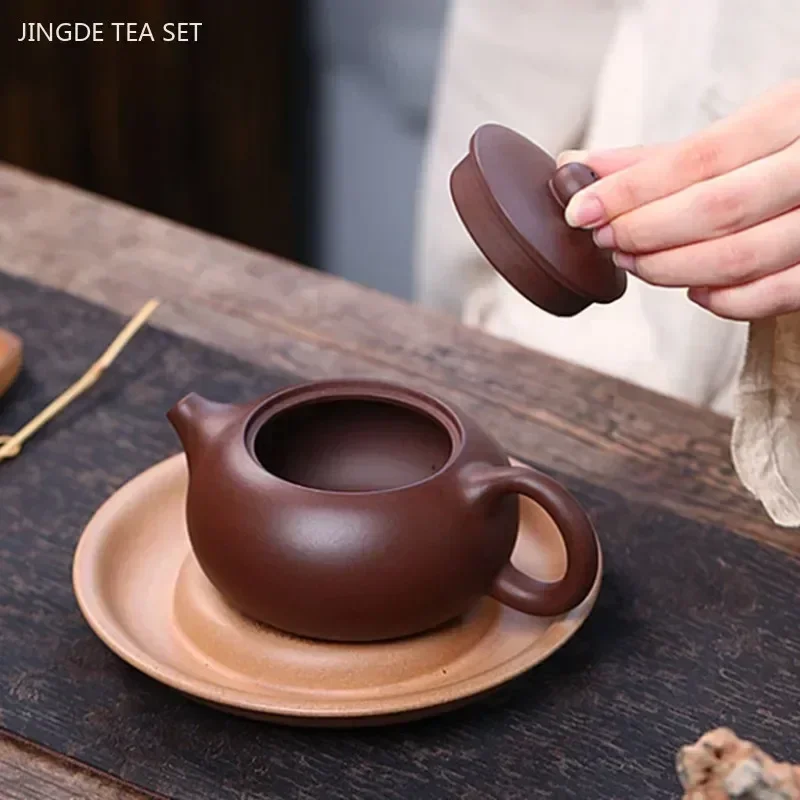 180ml Chinese Yixing Purple Clay Teapot Raw Ore Ball Hole Filter Teapot Custom Zisha Xishi Teaware Handmade Beauty Tea Infuser