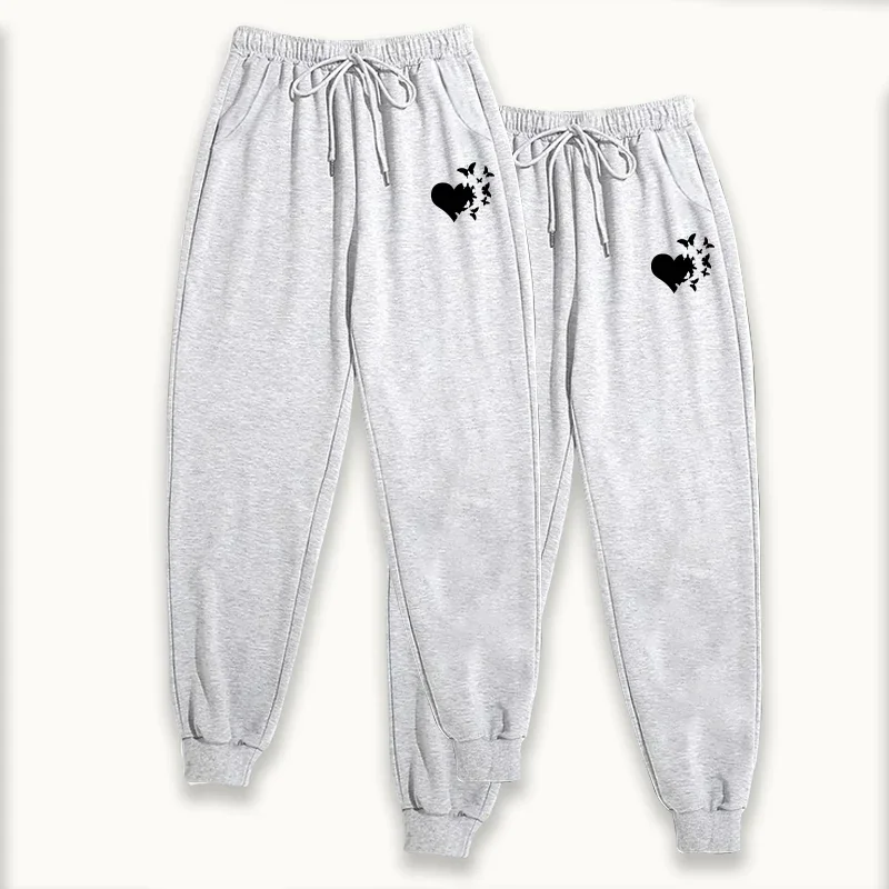 ชุดเซ็ต 2 ชิ้น กางเกงจ็อกเกอร์ผู้หญิง ปี 2025 แพ็ค 2 ตัว กางเกงสเวตแพนท์สีพื้นลำลอง กางเกงเลานจ์ใส่สบายสำหรับฤดูใบไม้ร่วงและฤดูหนาว กางเกงออกกำลังกายกลางแจ้งทรงสปอร์ต