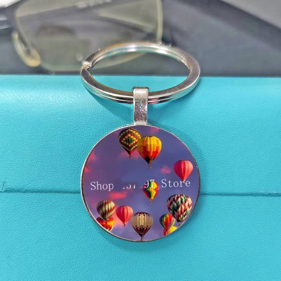 Elegant, fashionable, artistic, sky at dusk, clouds and clouds, hot air balloon pattern, keychain, student friend gathering, gif
