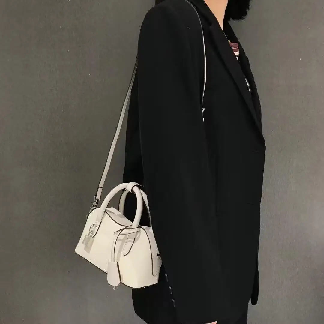 

Versatile and Luxury Handbag with Charming Simplicity Style and Pendant Women's Popular and Fashion Shoulder Crossbody Bag