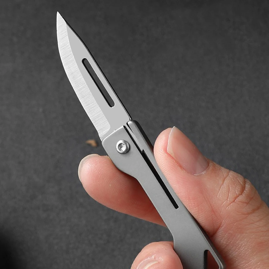 EDC Titanium Folding Knife Mini Keychain Carrying Pocket Knife Unpacking and Unpacking Express Knife Fruit Knife