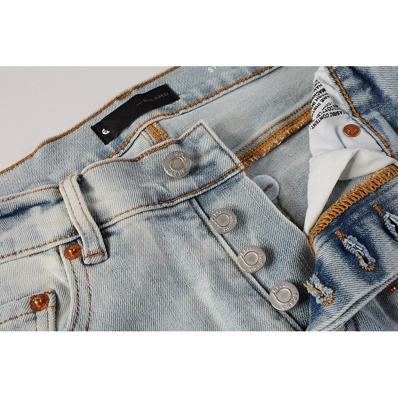 Jins Denim jalanan pria, celana Jeans sobek kancing kurus biru muda, jalanan tinggi Distressed