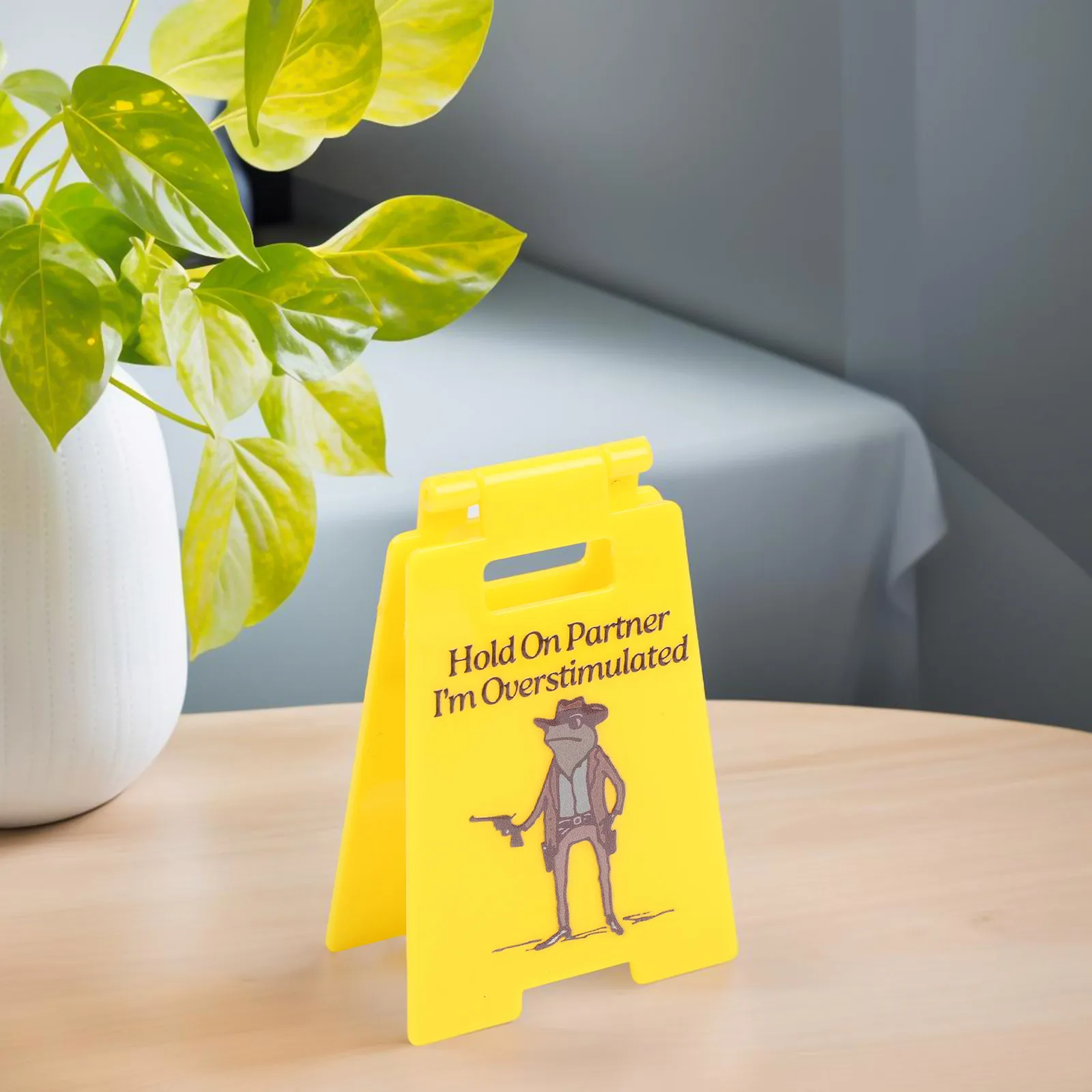 Hold On I'm Overstimulated Humorous Workspace Sign That Communicates Need for Quiet Focus Amidst Busy Office Life
