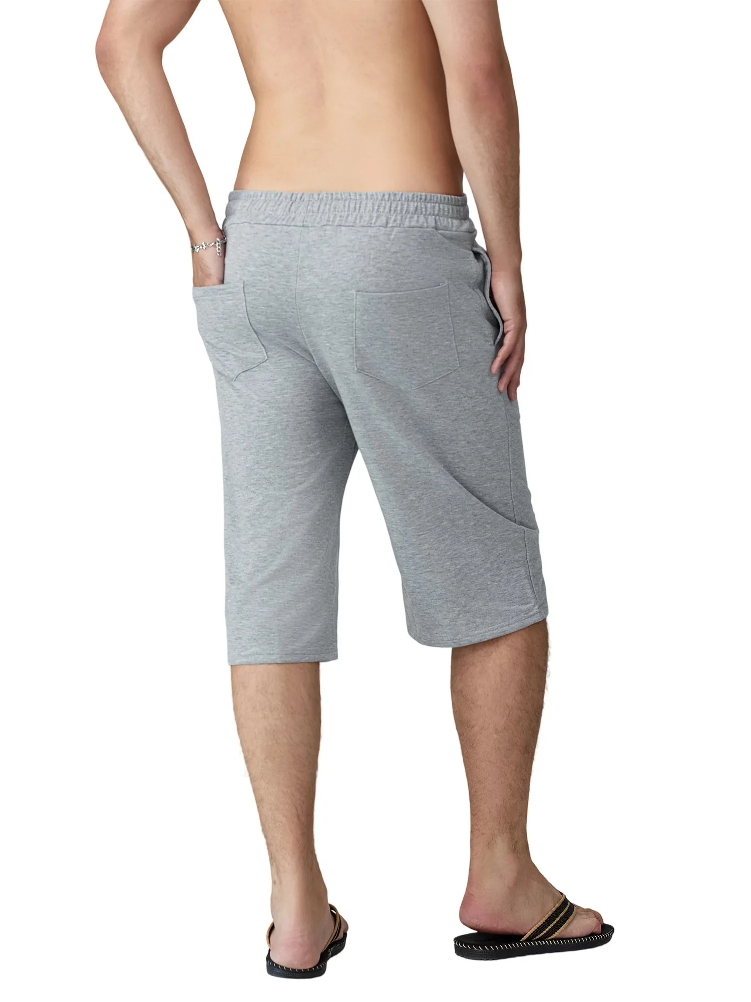 

Мужские шорты до колена с эластичным поясом и шнурком. Свободный крой. Однотонные длинные шорты в стиле хип-хоп с карманами.