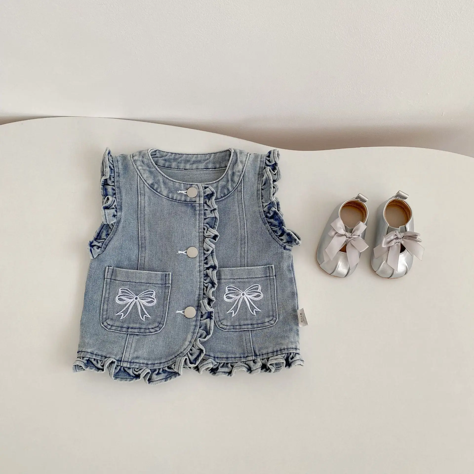 

Spring and Autumn new 2-3 year old baby clothing, fashionable baby girl denim vest cardigan, bow print