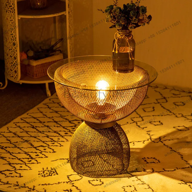 

Light luxury creative wrought iron designer edge few tempered glass decoration can shine