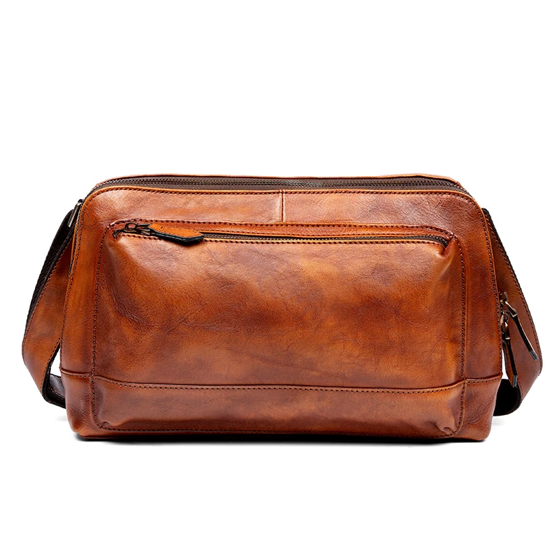 Casual messenger bag men's first leather shoulder bag leather men's bag fashion Korean handmade backpack tide brand.