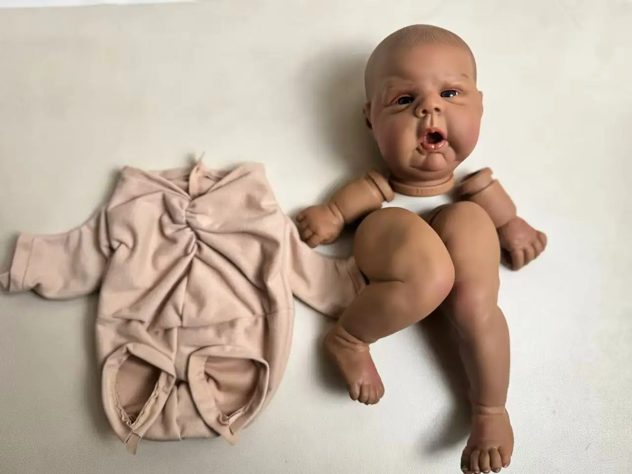 

NPK 20'' Hand-painted Dark Skin Reborn DIY Parts Gounchi with Cloth Body and Eyes Include Collectible Doll Kit for Children Gift