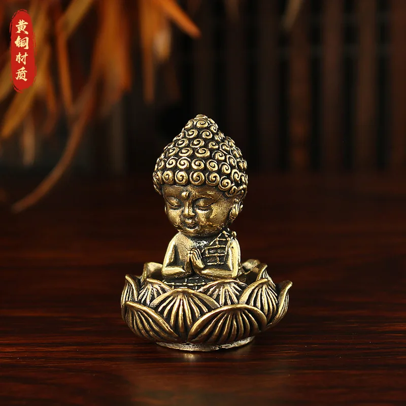 Brass Shakyamuni Buddha statue with a lotus base, suitable for display in a living room, entryway, or on a tea table