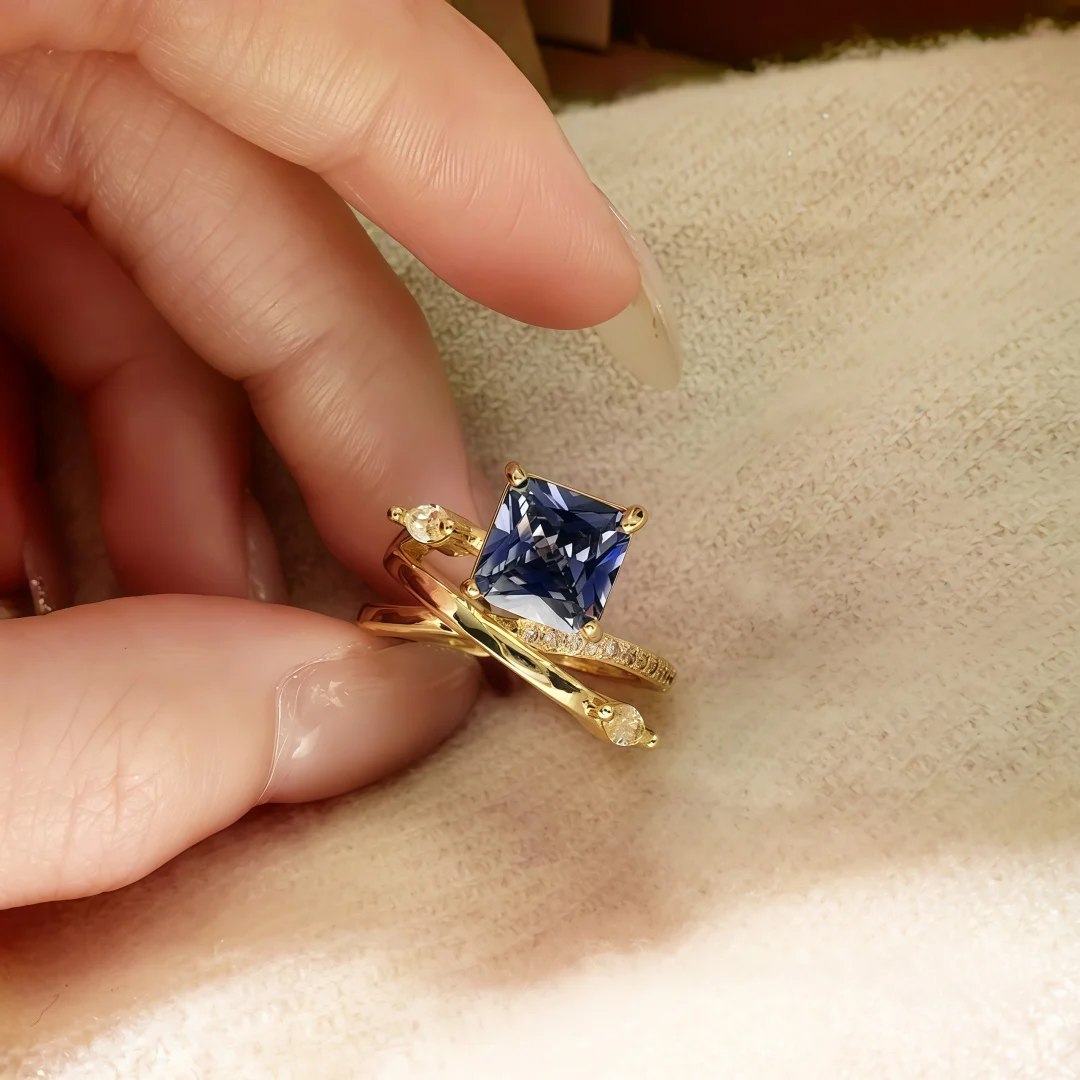 925 Sterling Silver Light Luxury Fashion Star Track Interweaving High-end Princess Square Tanzanite Blue Open Ring for Women