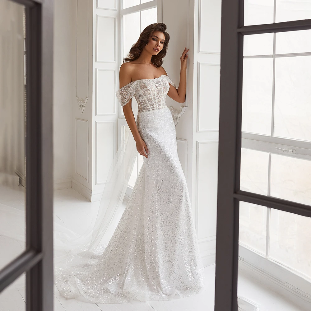 

Bohemaid Off Shoulder Sequins Shiny Wedding Dress Mermaid Backless Bow Floor Length Bridal Dress with Train Custom Made