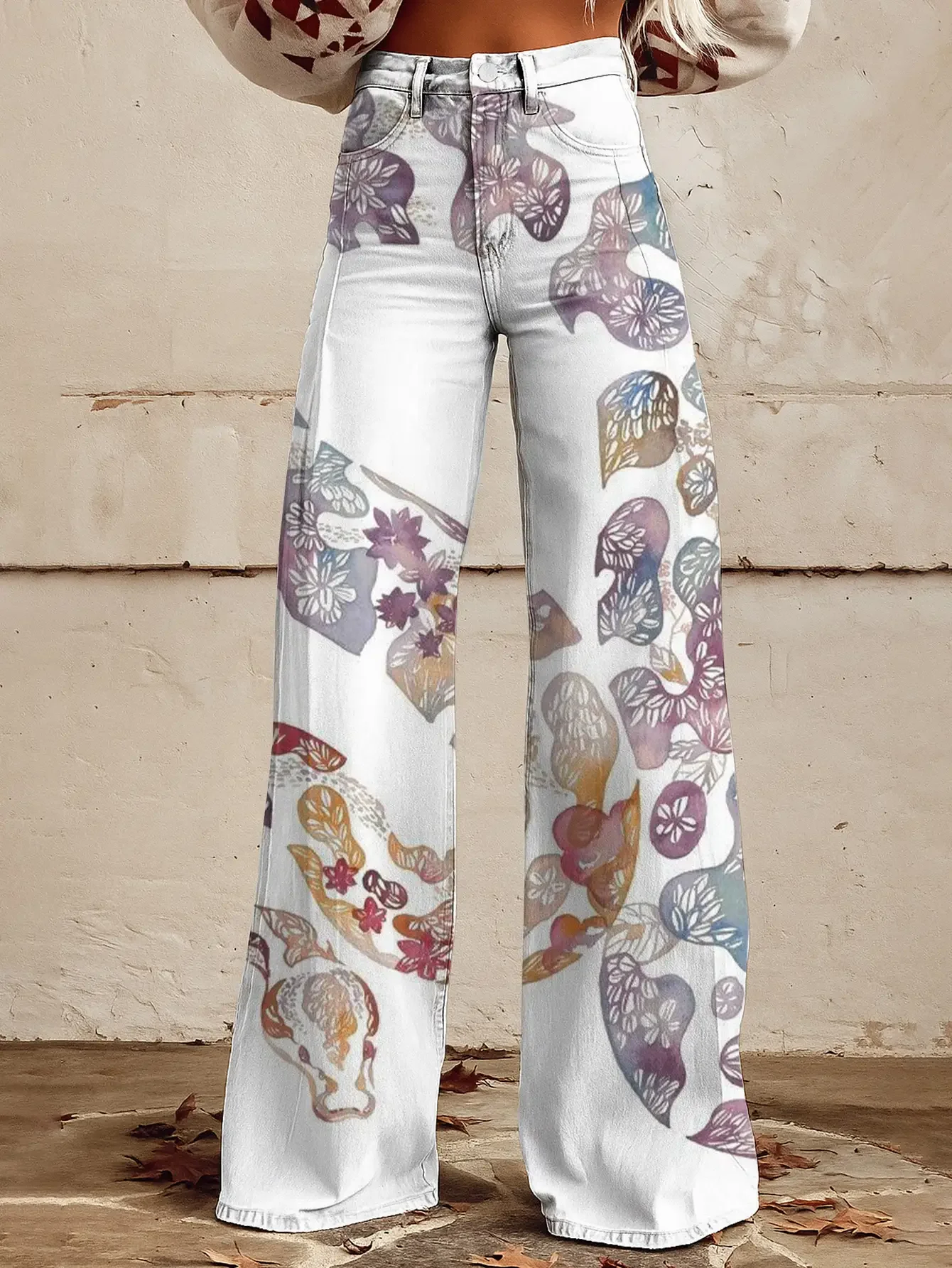  Casual jeans with a variety of colorful western prints, loose wide leg design, and fun printed women's pants