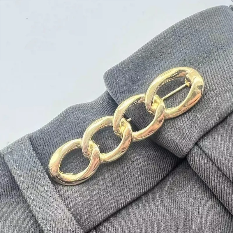 Hebilla de cintura Simple para apretar pantalones, cierre de aleación, ropa, dispositivo de ajuste de cintura retráctil, botón de cintura