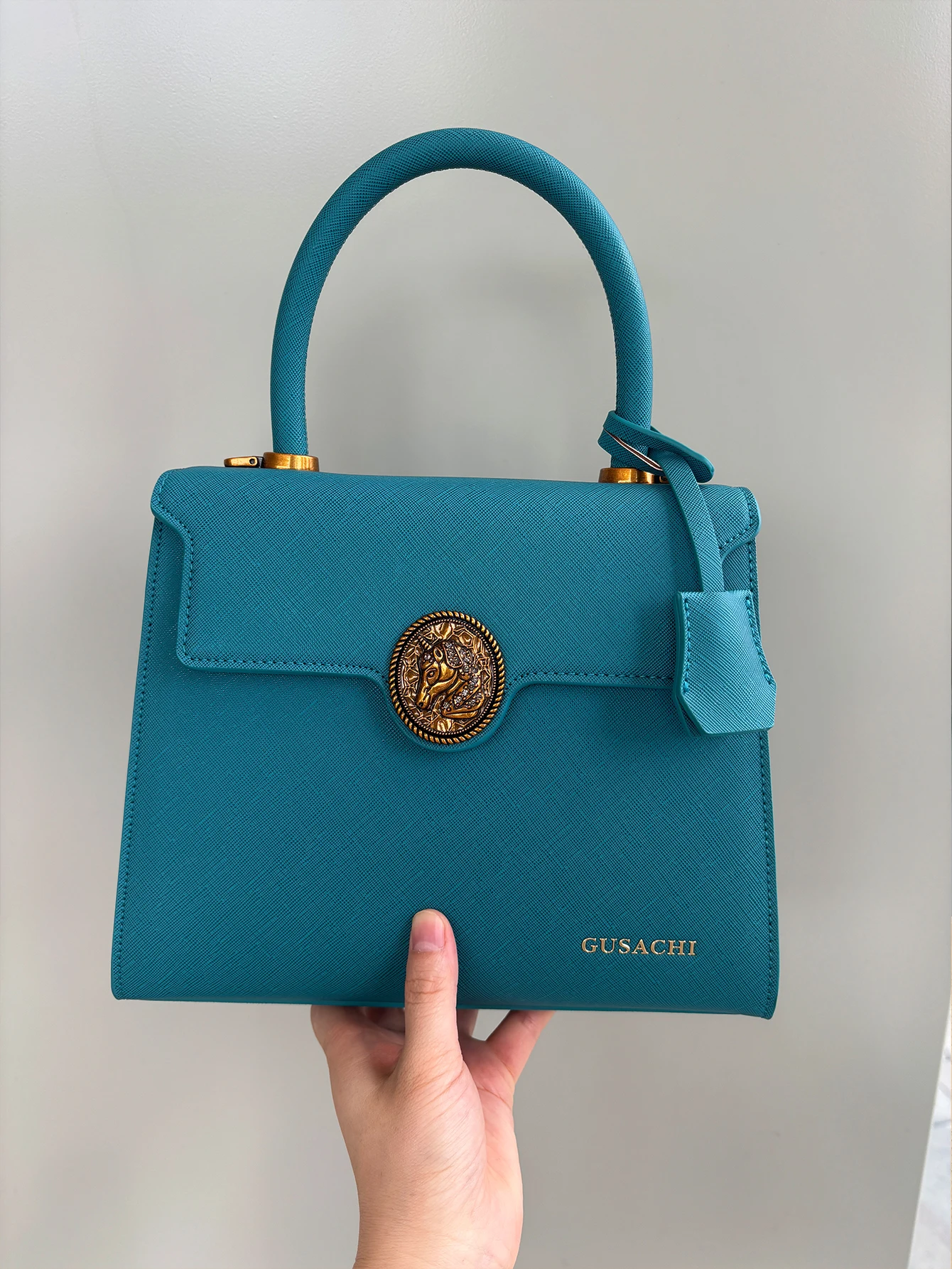 Modische neue Damenhandtaschen 2026 mit hohem Stilgefühl, Kong Quelan-förmige Handtasche mit Retro-Hardware, Joker-Handflächenmuster-Textur. – Detail 7