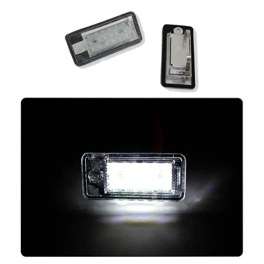 

⭐ Оригинальный ⭐ Белые светодиодные фонари для номерного знака (2 шт.) для Audi A3, S3, A4 B6, B7, A6 C6, 4F, Q7, RS4. Аксессуары для автомобилей.