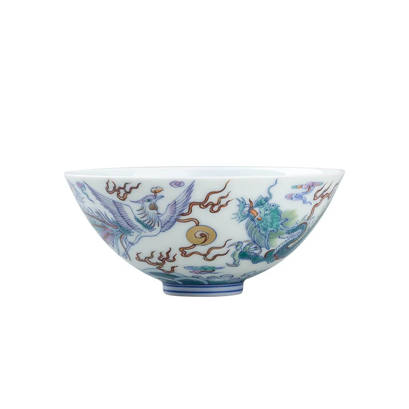 Handmade blue-and-white doucai dragon and phoenix master tea cup at Jingdezhen kiln site, single-handed painted