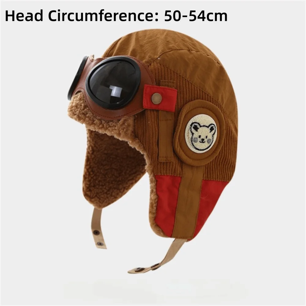 ใหม่หมวกนักบินการ์ตูนน่ารักกันลมพร้อมแว่นตาป้องกันหูหมวกกันความเย็นหนาหมวกอบอุ่นเด็ก