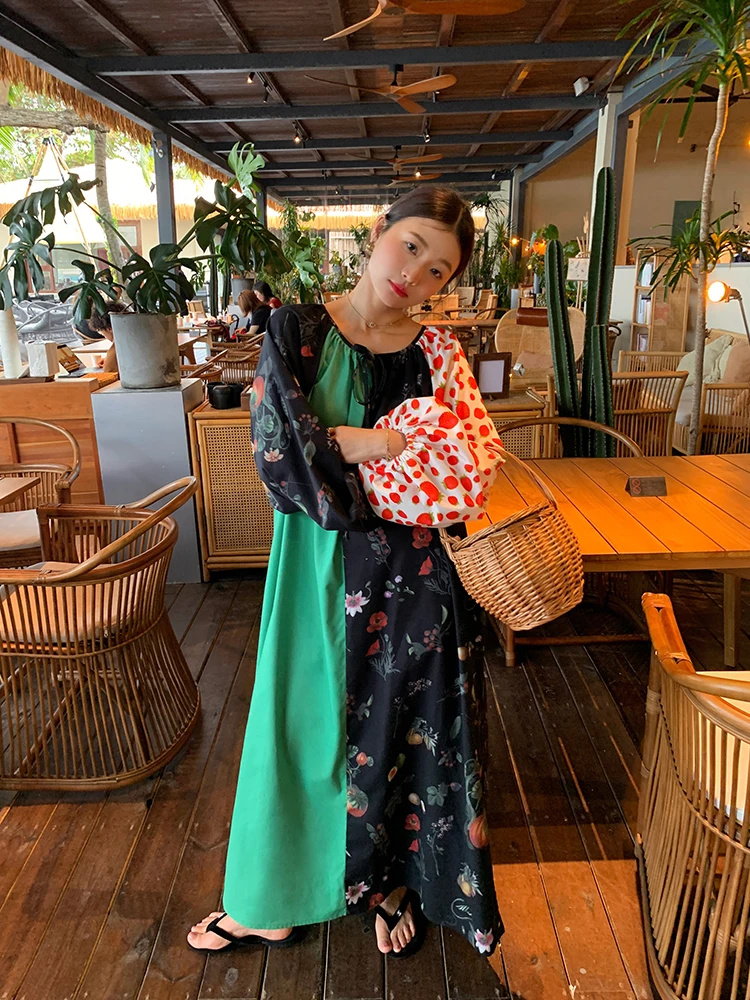 กระโปรงยาวทรงเอพิมพ์ลายดอกไม้สไตล์หลวมสำหรับผู้หญิง ดีไซน์ต่อผ้า  ใส่ได้ทุกฤดู ทั้งฤดูใบไม้ผลิ ฤดูร้อน ฤดูใบไม้ร่วง และฤดูหนาว
