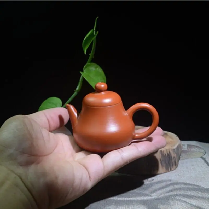 

Продается на большие потеря, 90 мл, чайник Chaozhou Zisha Zhu, глиняный горшок с маркировкой грушевидной формы