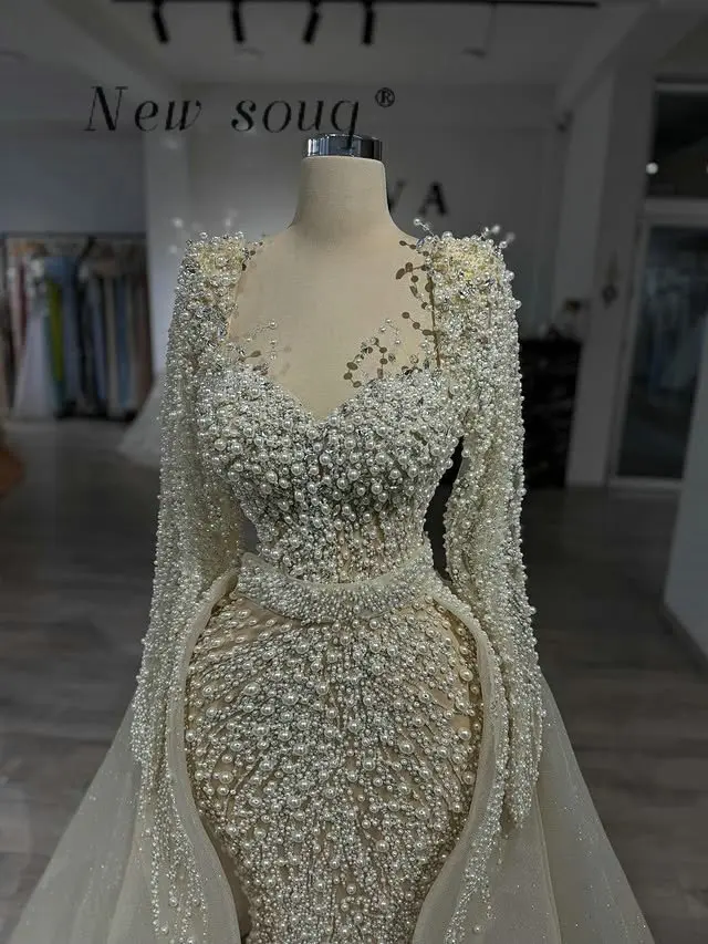 Eleganckie beżowe suknie wieczorowe typu syrena z długimi rękawami, zdobione perłami, z odpinanym trenem, na formalne przyjęcia weselne, szyte na miarę, kolekcja 2026.