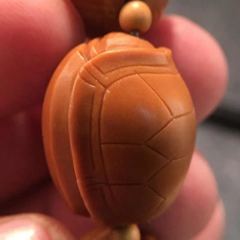 pit bracelet, rich and prosperous, olive wood carving , turtle shell, world-class collectible, fortune-bringin