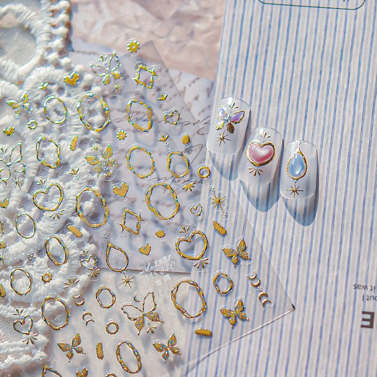 กรอบรูปดาวอัญมณีหรูหรา นาฬิกาทรงไม่สม่ำเสมอ บล็อกโลหะ ดาวเคราะห์ รูปทรงเรขาคณิต ดวงจันทร์ หัวใจ สติ๊กเกอร์เล็บลายเลเซอร์สุดหรู