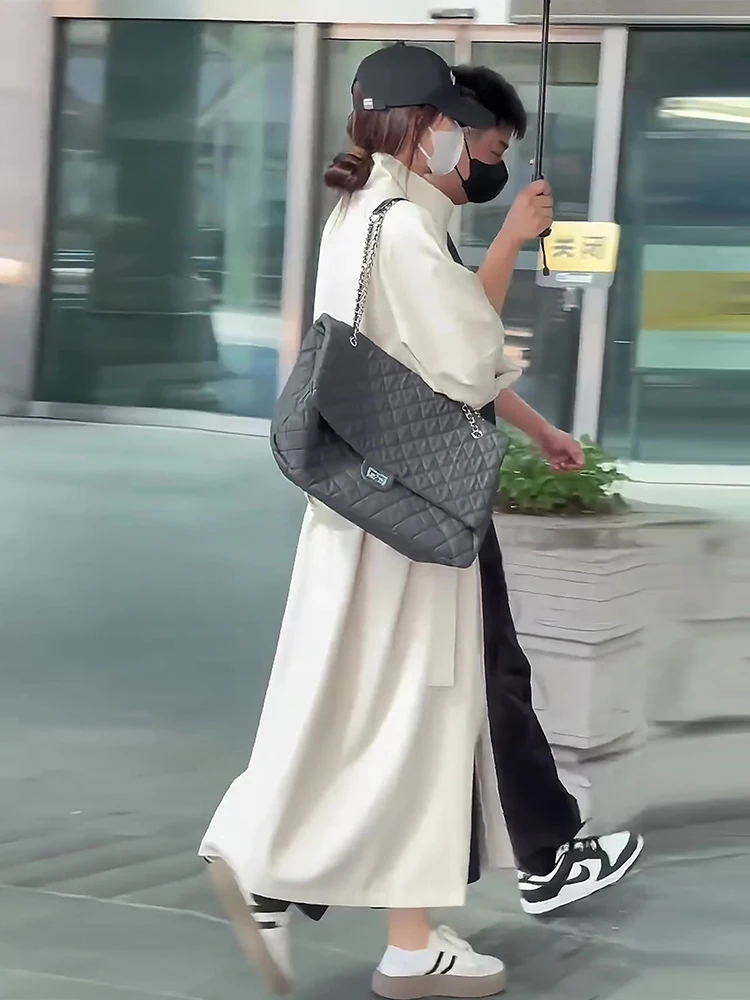 เสื้อโค้ทผู้หญิงสีเบจ สไตล์ลำลอง สำหรับฤดูใบไม้ร่วงและฤดูหนาว ทรงยาว คอตั้ง ติดกระดุมสองแถว ทรงหลวม สไตล์สบายๆ แฟชั่นลำลอง