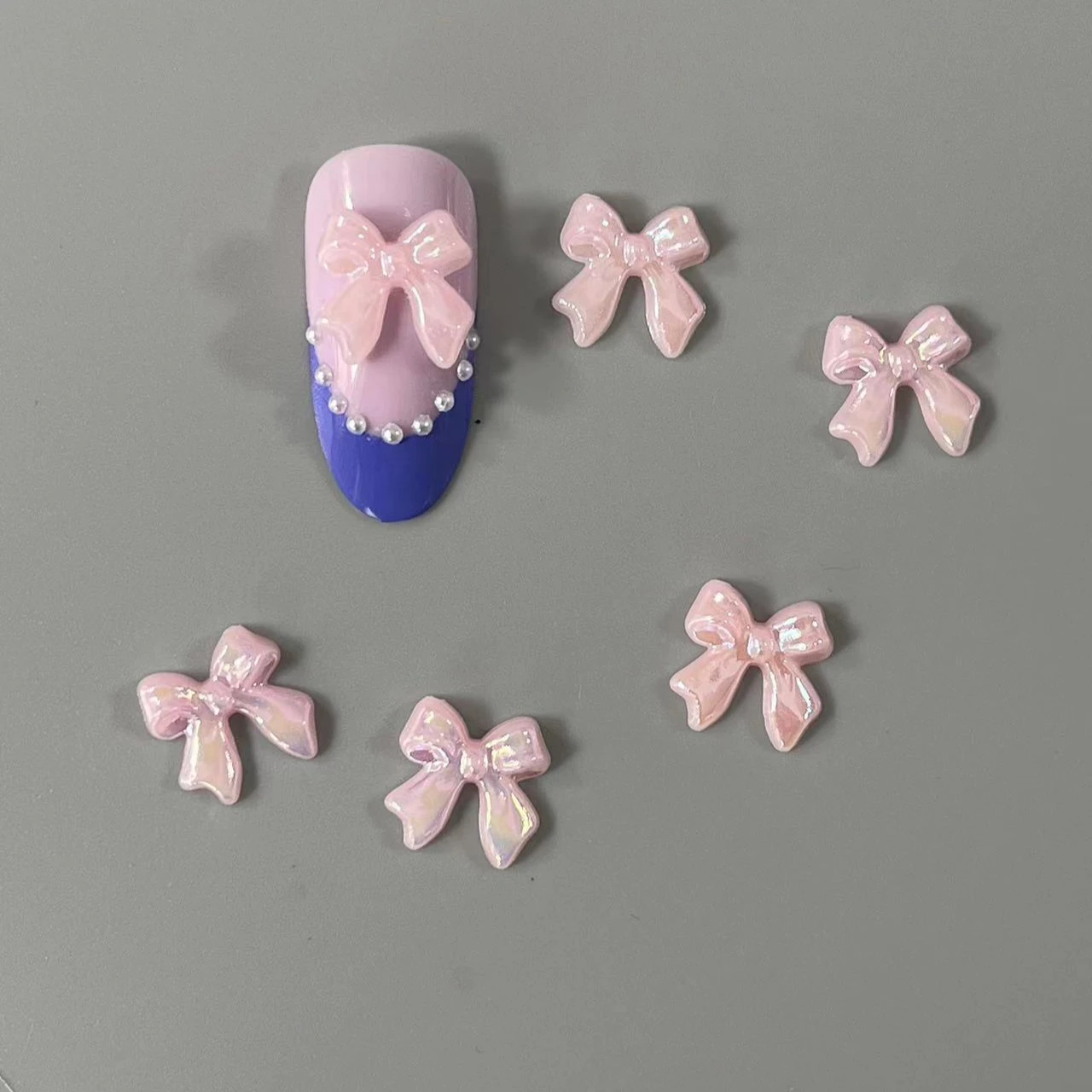 100PCS/Bag Bow Knot AB Colorful Resin Nail Art Decoration Accessories Charms 3D Kawaii 11*11MM Ribbon Nail Jewelry Gems