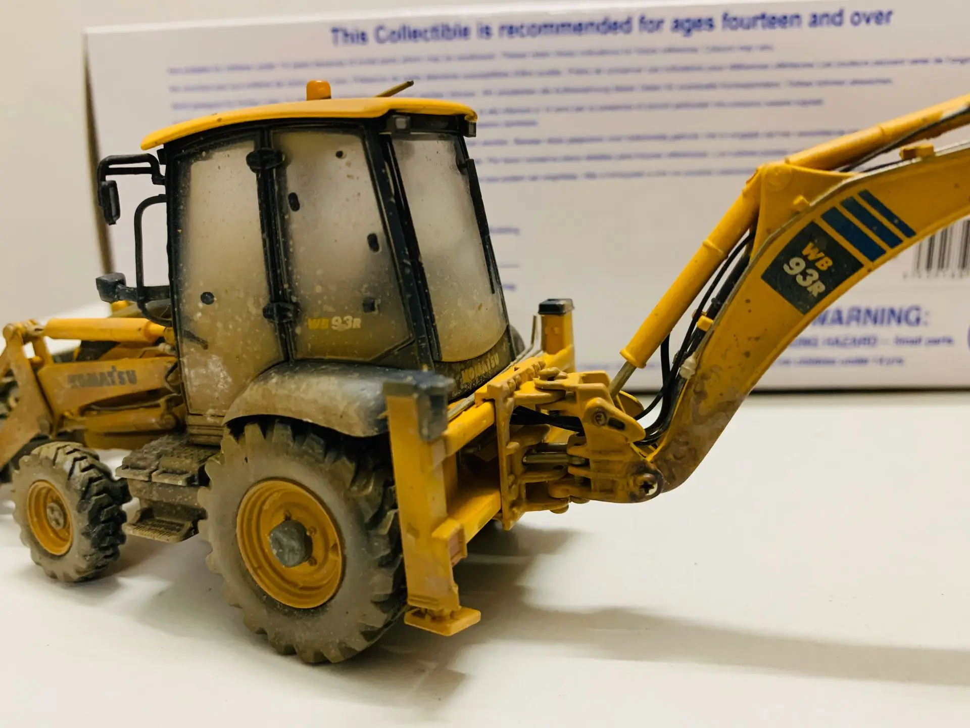 Komatsu WB93R-8 Backhoe Loader Muddy Version 1:50 Scale DieCast Model UH8142 New