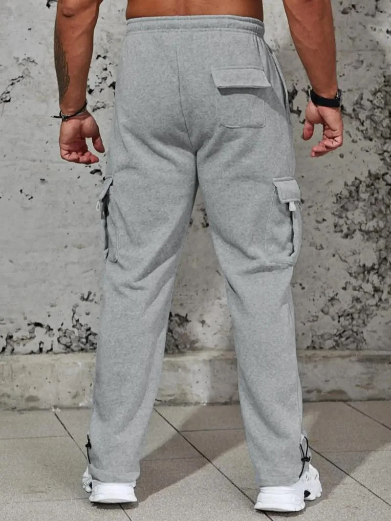 Pantaloni sportivi da jogging elasticizzati in vita elastica da uomo - neri con tasche multiple, chiusura con coulisse e strisce laterali