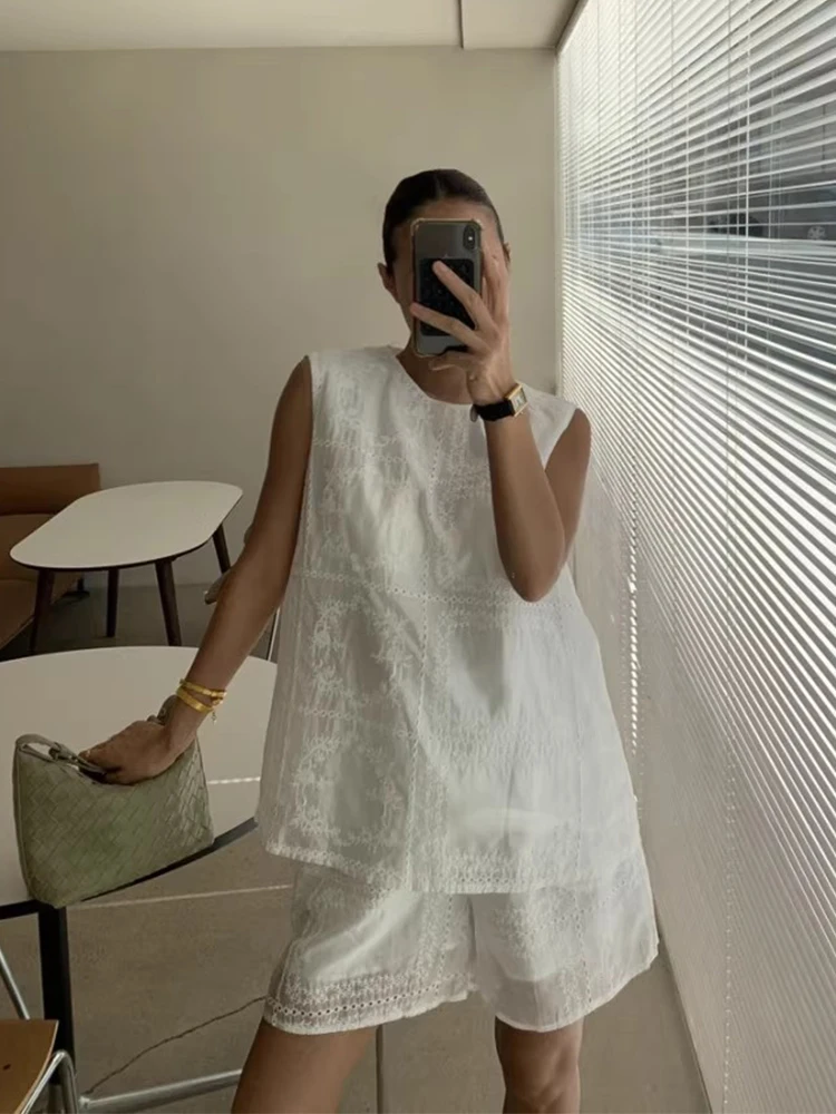 

Clothland Women Sweet White Lace Suit Embroidery Sleeveless Shirt Elastic Waist Mini Shorts Cute Two Piece Set TA660