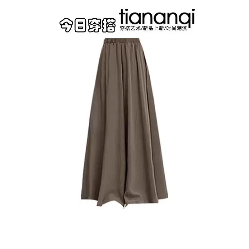 Abito in stile coreano autunno e inverno con temperamento femminile maglione lavorato a maglia a righe giacca lunga pantaloni casual set da tre pezzi