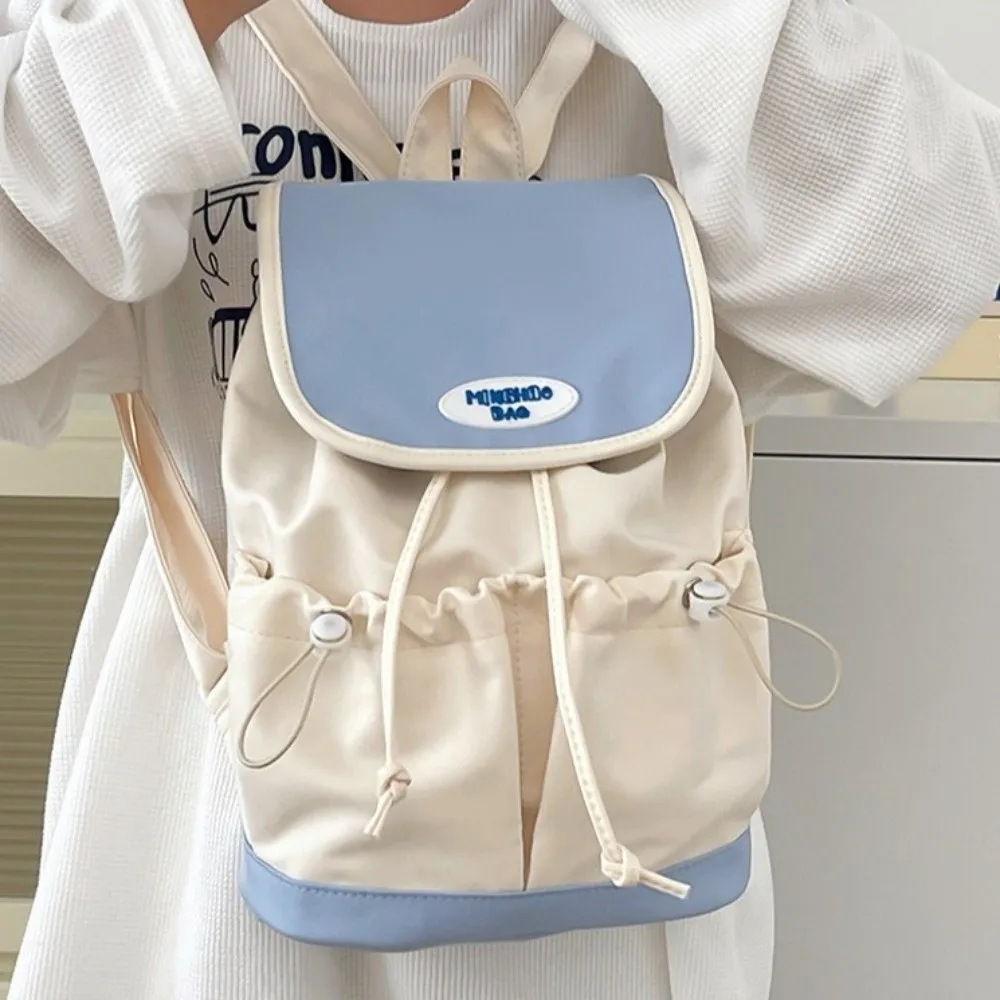 حقيبة ظهر بسيطة برباط من النايلون بسعة كبيرة على الطراز الكوري حقيبة كتف متعددة الجيوب حقيبة مدرسية ملونة للطلاب هدية