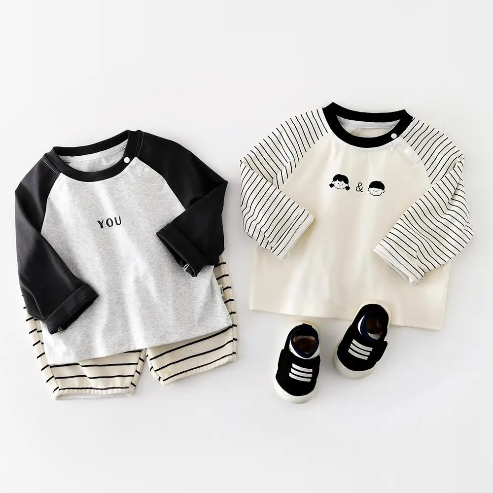 2026 ربيع جديد طفل طويل الأكمام تي شيرت القطن الرضع الفتيان عادية مخطط تي شيرت الفتيات طباعة قاع القمصان طفل الملابس