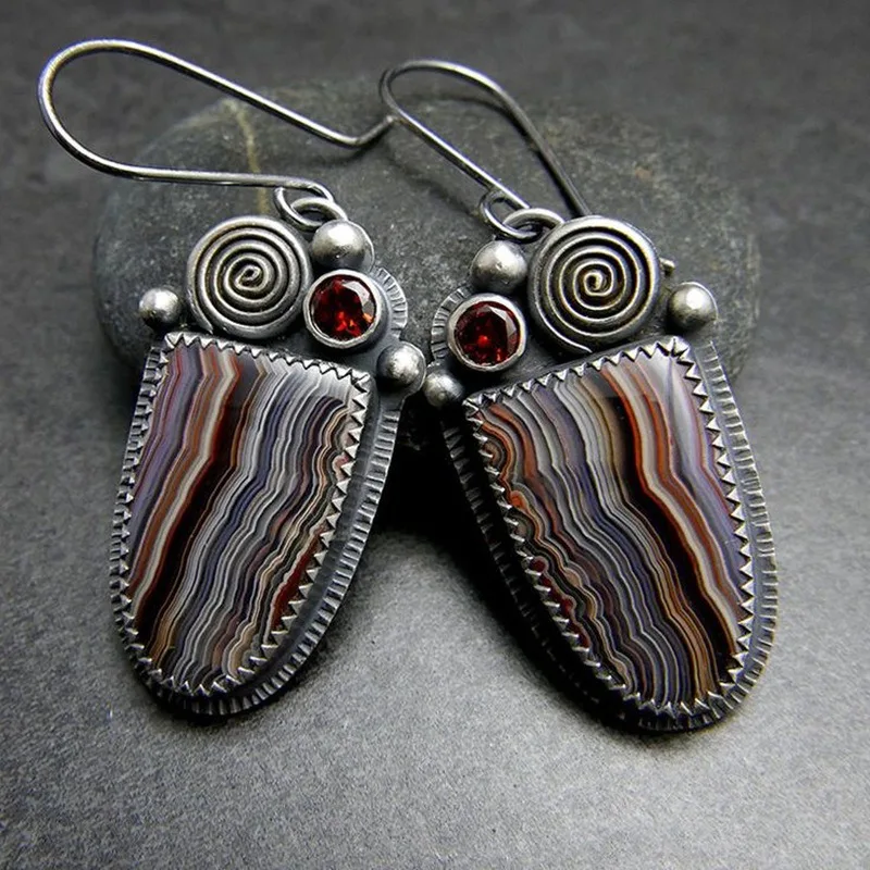 

Ethnic style abstract pattern enamel earrings retro creative spiral design inlaid with red diamonds pendant earrings women