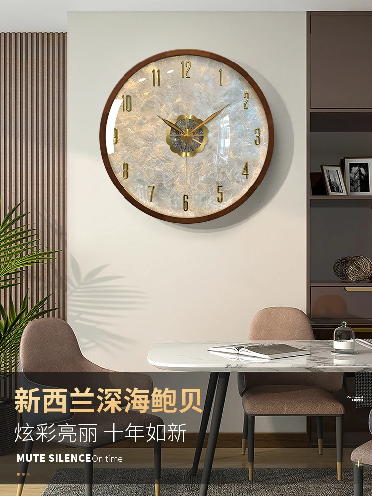 

Modern light luxury shell wall clock, solid wood creative wall watch, clock, living room home atmosphere 2024 new wall clock