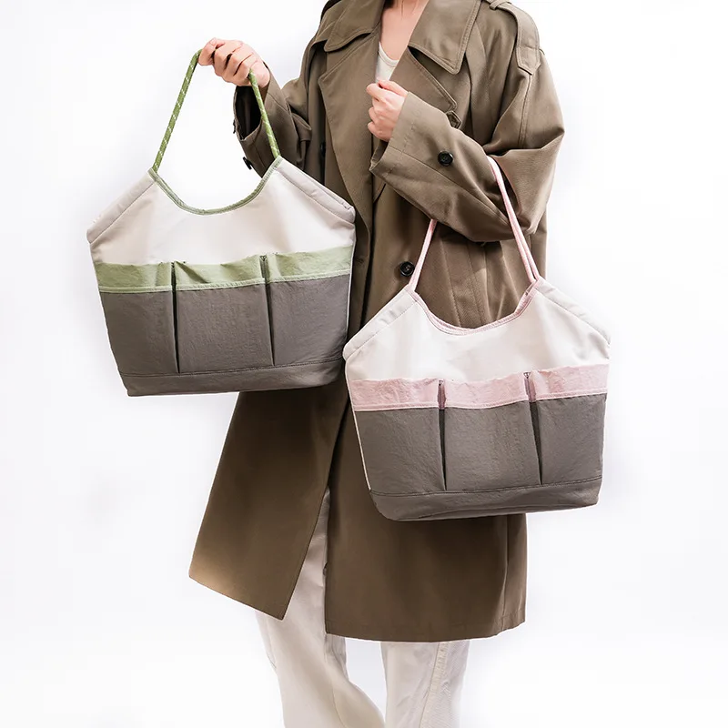 

Stitching collision color female handbag simple large capacity multi-pocket portable storage mommy shoulder bag