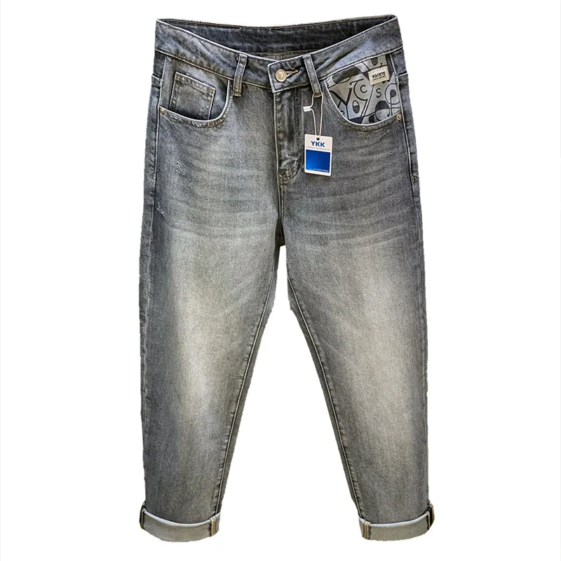 2025年春夏のメンズジーンズ、小さな足のプリント、ゆったりとしたカジュアルなストレッチデニム、ロングパンツ