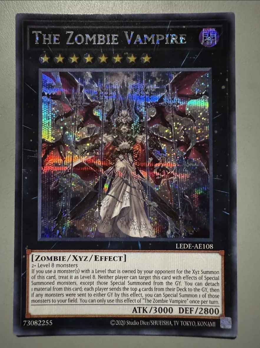 

Yugioh KONAMI Duel Monsters LEDE-AE108 The Zombie Vampire Secret Rare Asian English Collection Mint Card