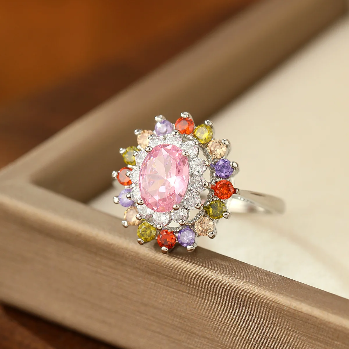 Elegant Pink Oval Ring - Rainbow Colored Cubic Zirconia Surround