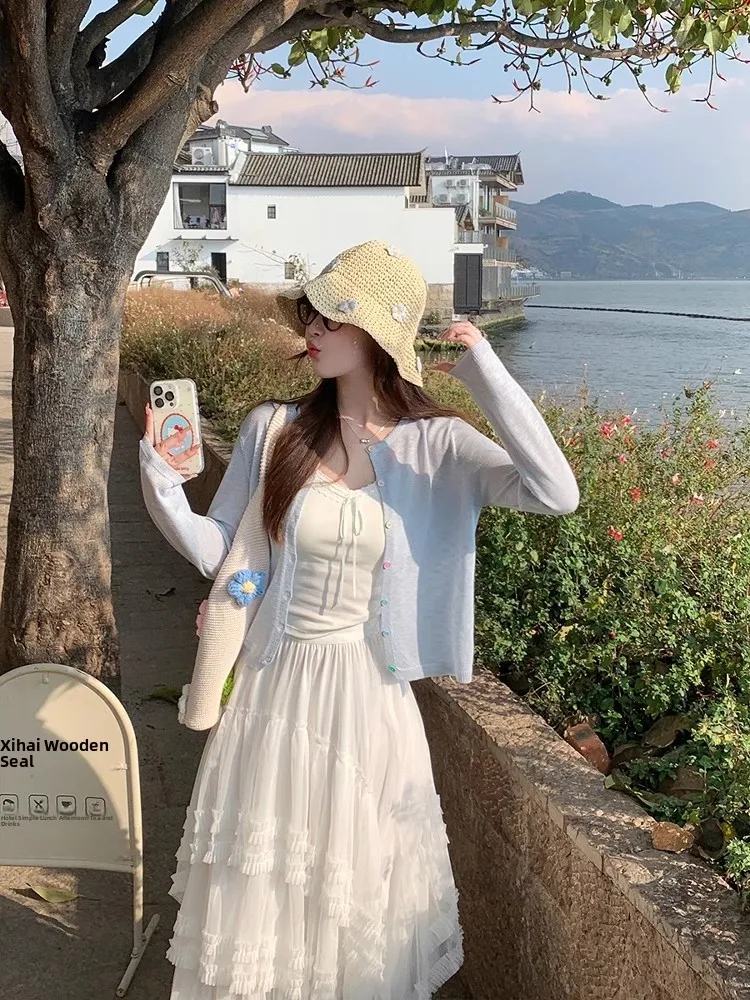 

Blue Ice Silk Sun Protection Cardigan with Strap Dres 2026 New Summer Thin Knitted Coat Soft Korean Sle Long Sve Top