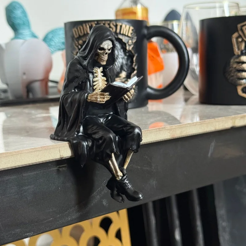Black Cloak Skeleton Scholar Resin Figurine, Sitting Demon Statue Reading Book,Dark Gothic Home Ornament Sculpture for Halloween