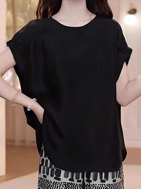 Letnia koszulka damska plus size, luźny krój, cienka, zapinana na guziki, styl koreański, modelująca sylwetkę typu gruszka.