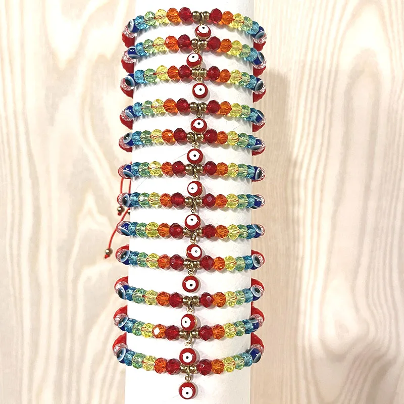 12 pulseras de cristal rojas y de colores de 6 mm con ojos rojos.