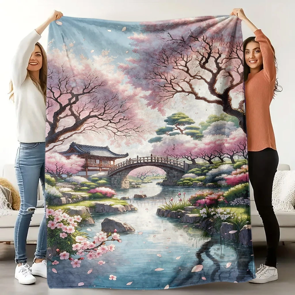 A Cozy Flannel Blanket Featuring a Cherry Blossom Tree And Ancient Bridge Theme, with High-Definition Digital Printing, Suitable