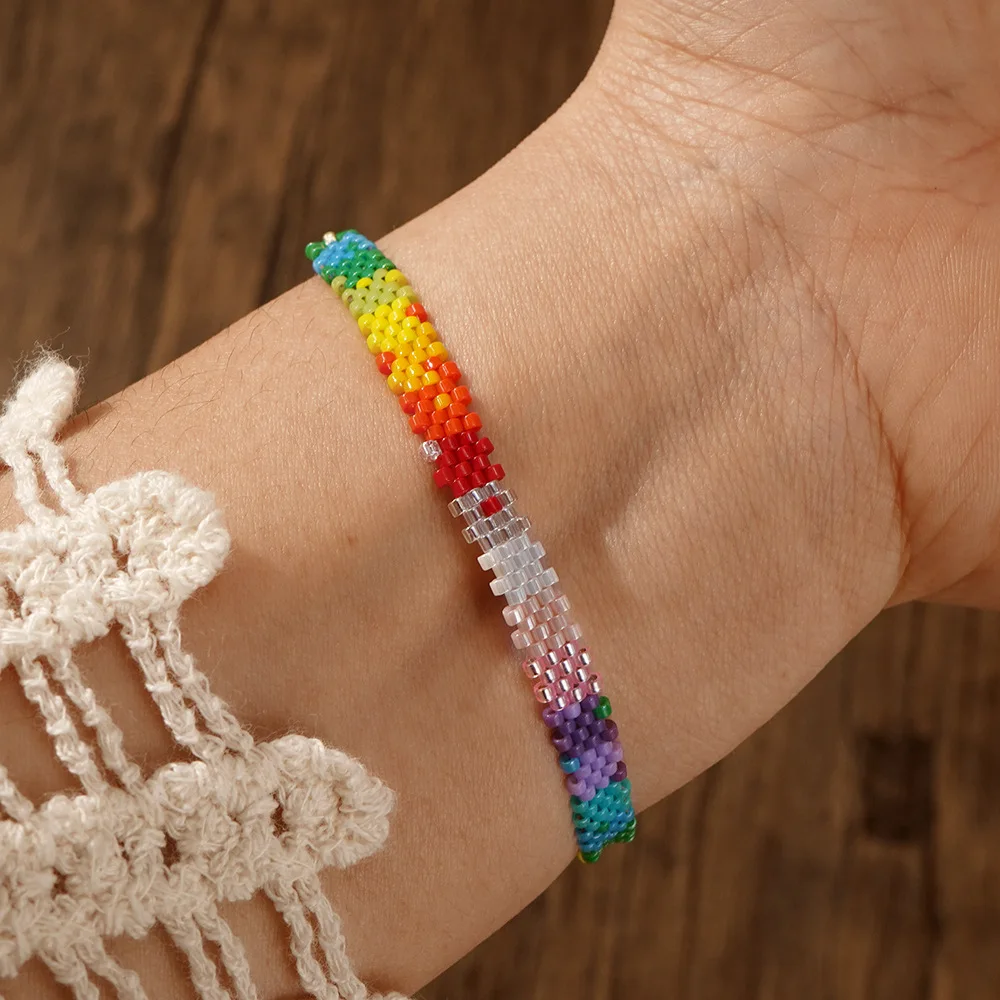 

Bohemia Rice bead bracelet Row 3 Rainbow Serrated edge Hand-woven National style Personality Retro Beaded bracelet