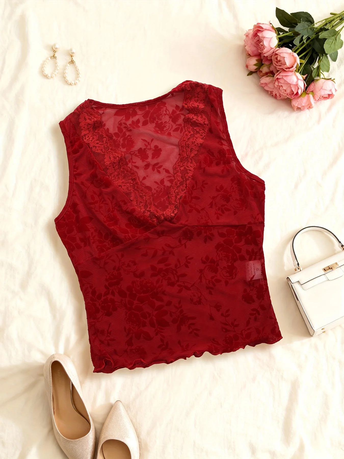 A red floral print for ladies, a stylish, elegant and chic off-the-beaten-path vest top exclusively for goddesses